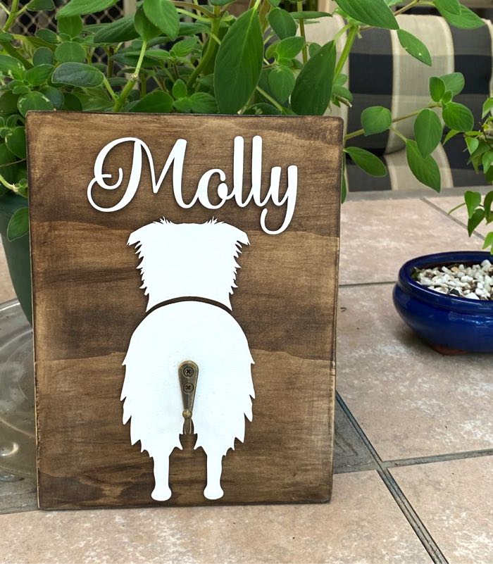 Walnut timber stained dog leash holder with white name - Molly and border collie silhouette and dog butt