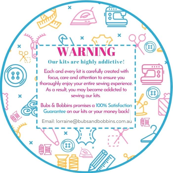 Warning sign from Bubs and Bobbins stating that their ready to sew kits are highly addictive.  Also stated there is a 100% satisfaction guarantee with all products with the email address to contact.