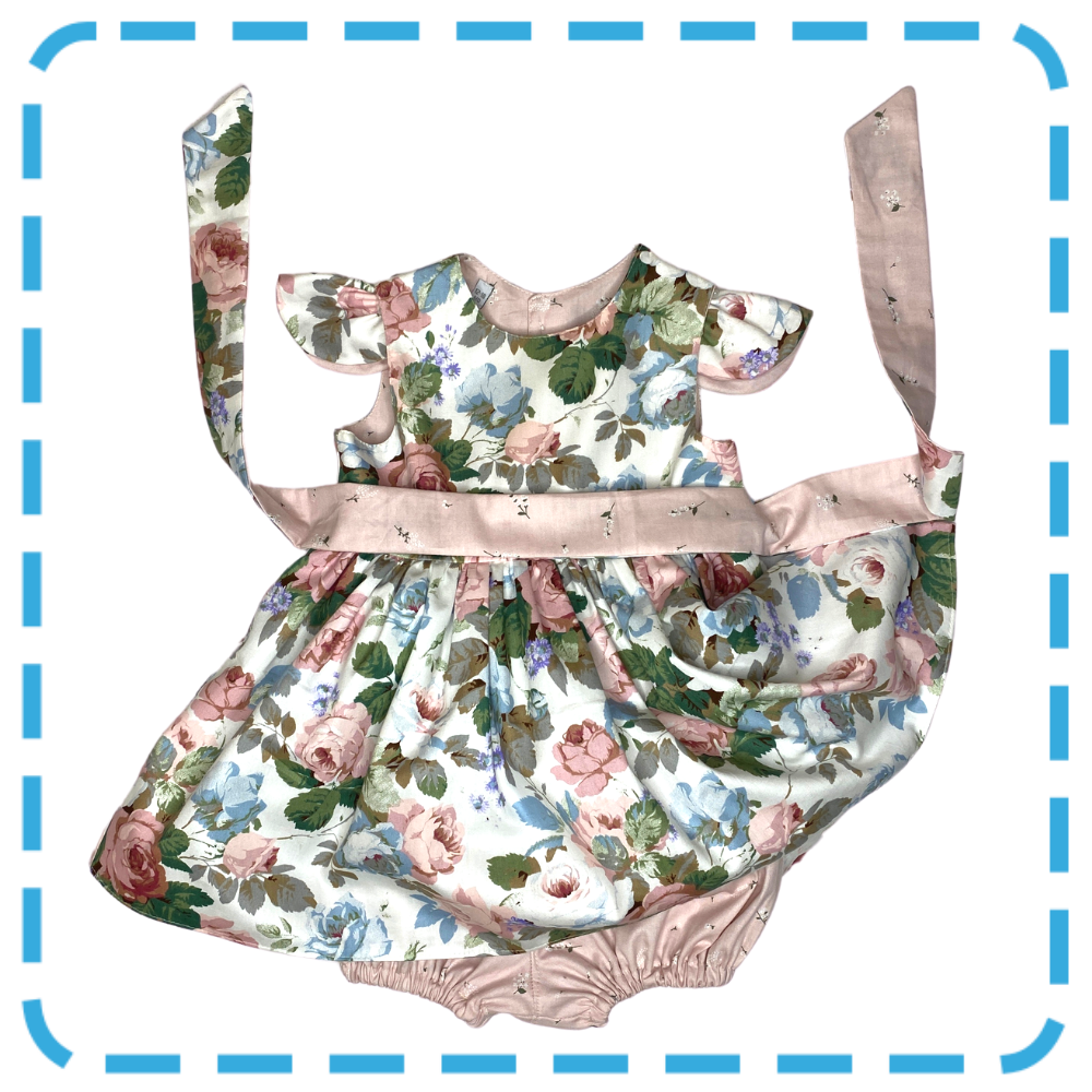 Bubs & Bobbins Amelia 4 in 1  baby and toddler dress in Dusky Rose print showing detachable waist sash and detachable flutters