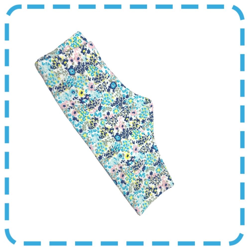 Side view of Little Bub Leggings in pastel floral colour - ready made.